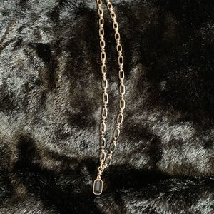 18” silver with sapphire  (I believe it’s costume item but there’s no tarnish )